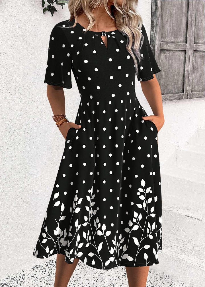 Vestido Negro con Lunares de Media Manga y Cuello Redondo