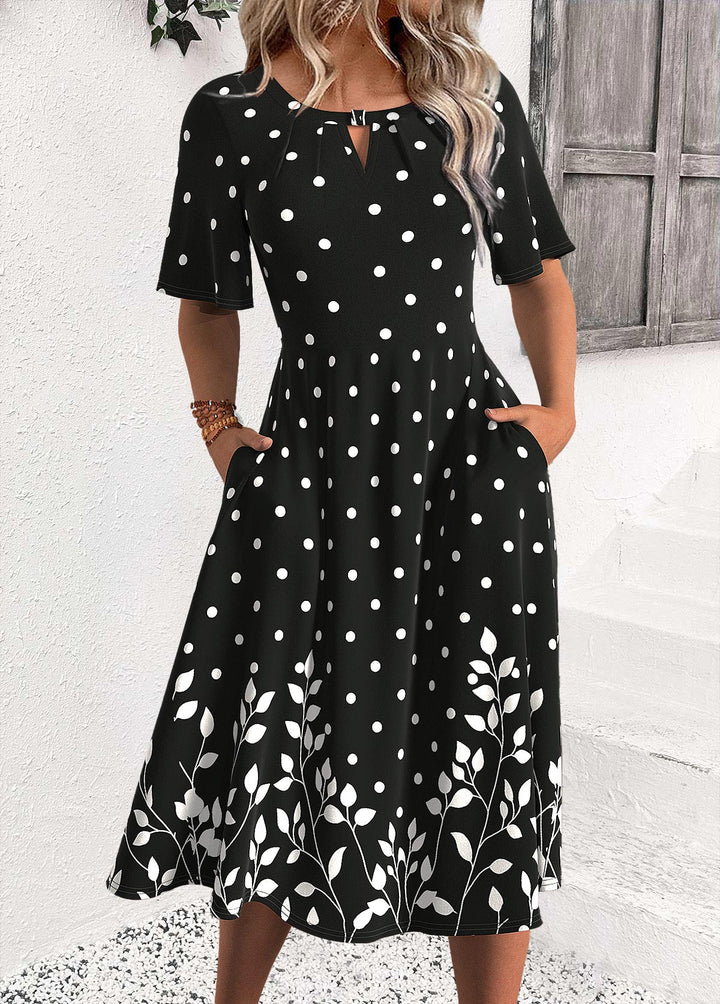 Vestido Negro con Lunares de Media Manga y Cuello Redondo