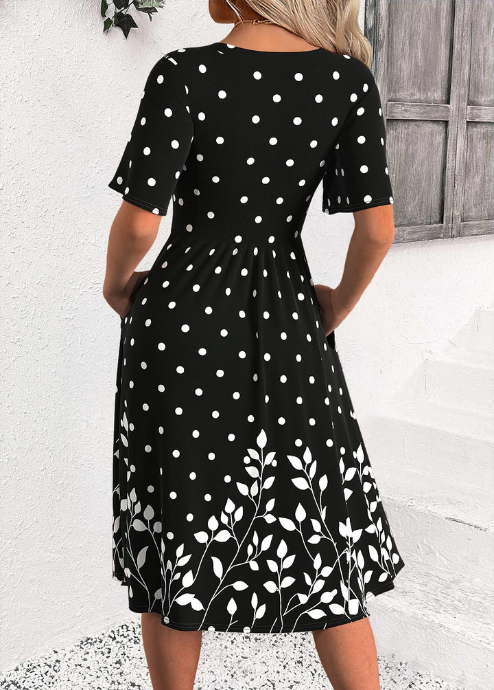 Vestido Negro con Lunares de Media Manga y Cuello Redondo